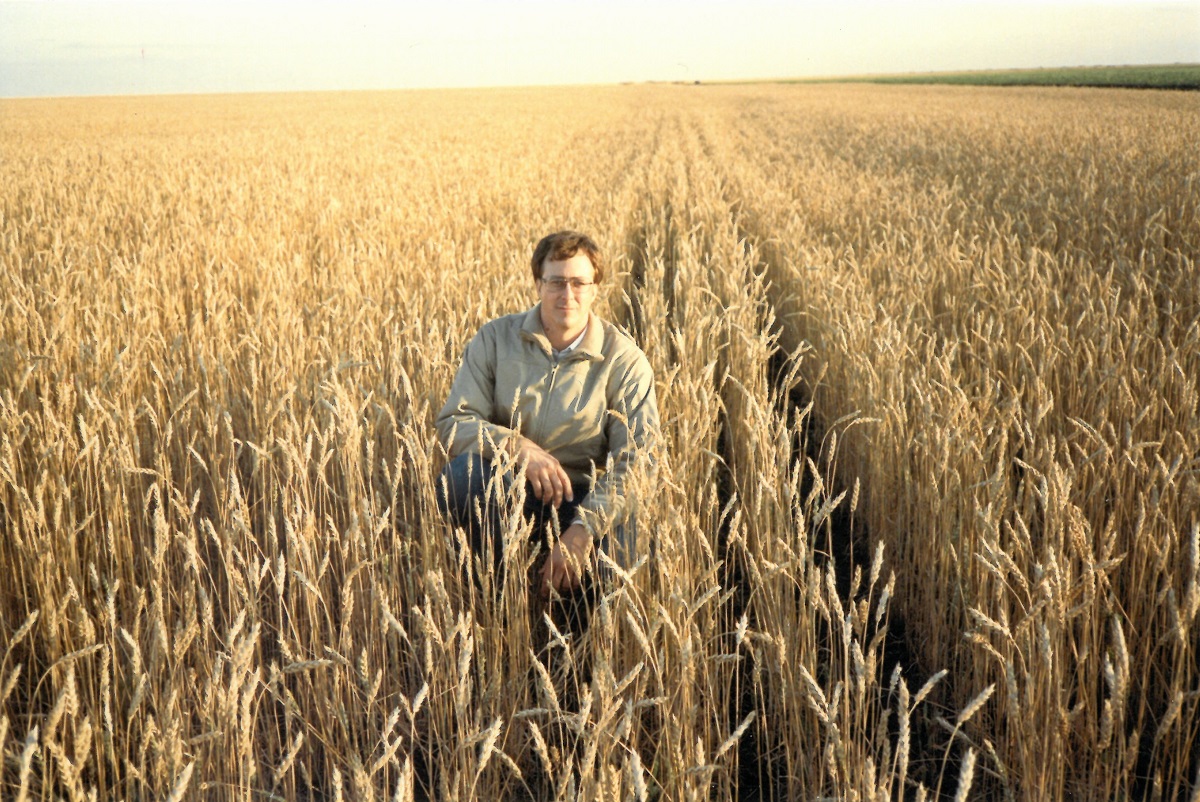 Neal Fischer in a field