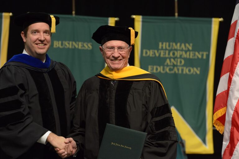 Spencer Duin receiving an honorary doctorate from NDSU in 2018