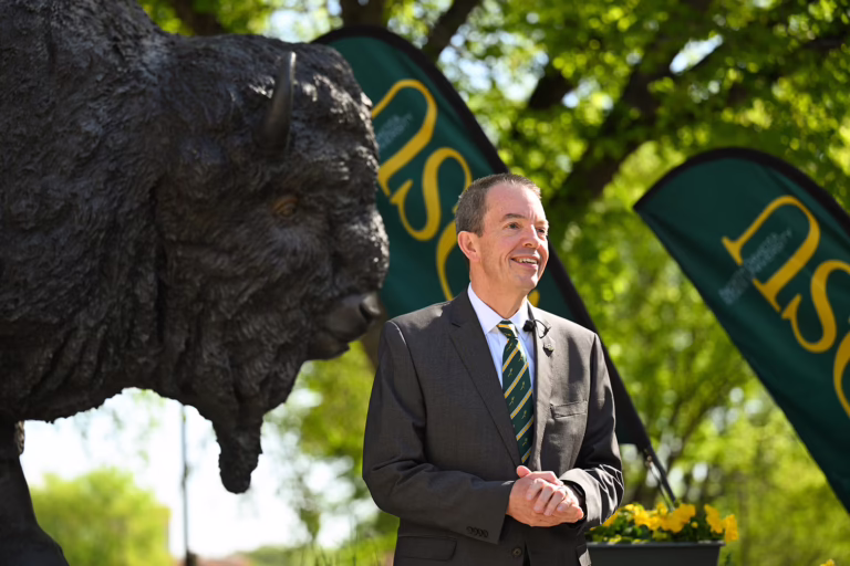 NDSU President Marshall Stewart speaks at a press conference on campus.