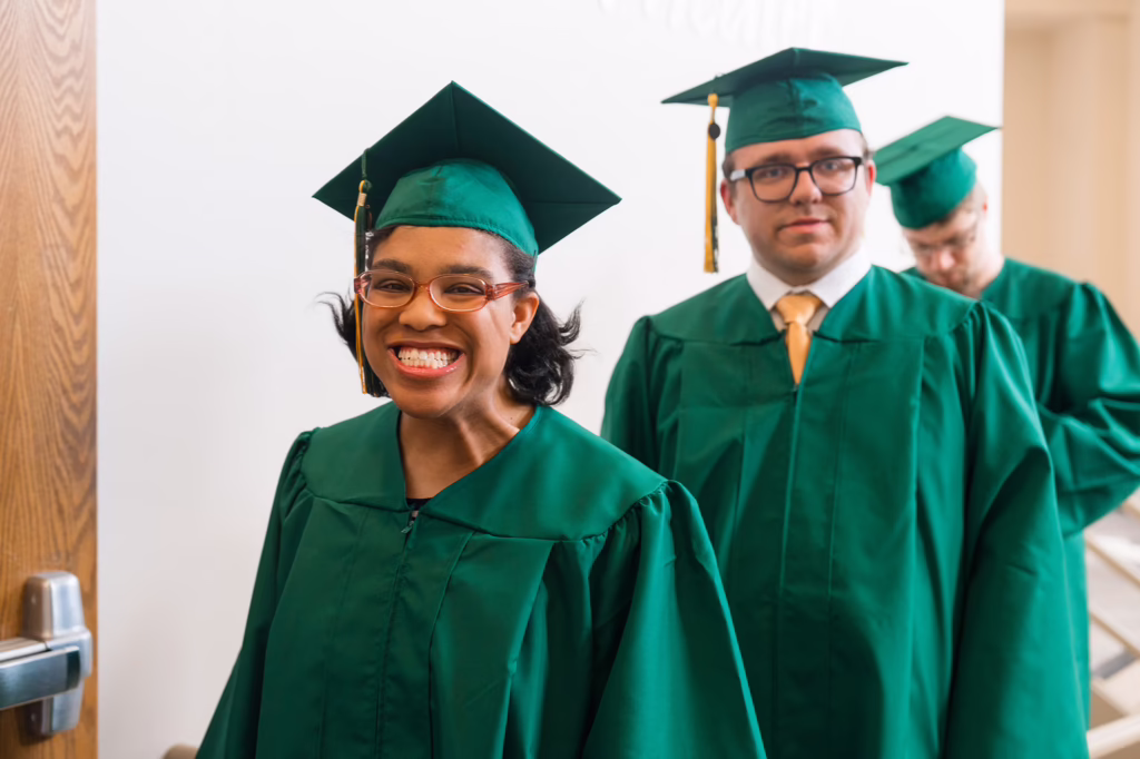 The Transition and Access Program graduates are all smiles after graduation.