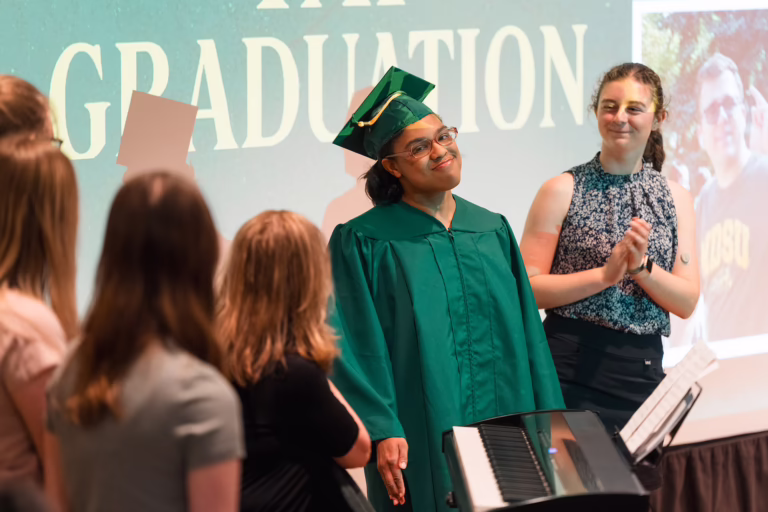 Alexander graduating from the NDSU Transition and Access Program.